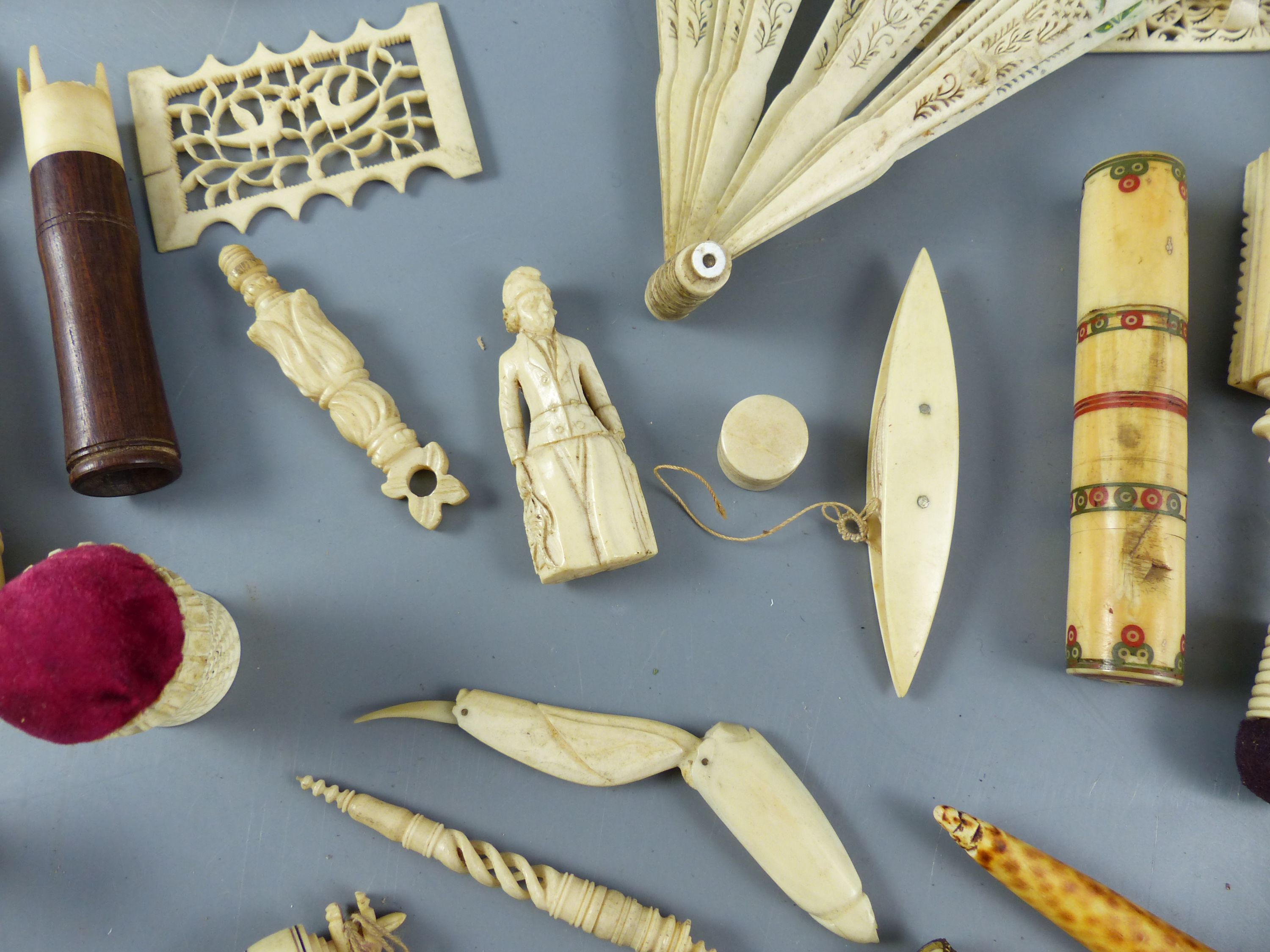 A group of assorted 19th century ivory sewing implements and objets dart